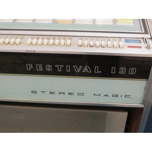 701 - Festival 130 Steromagic Juke box. Working condition unknown, however lights come on when plugged in.... 