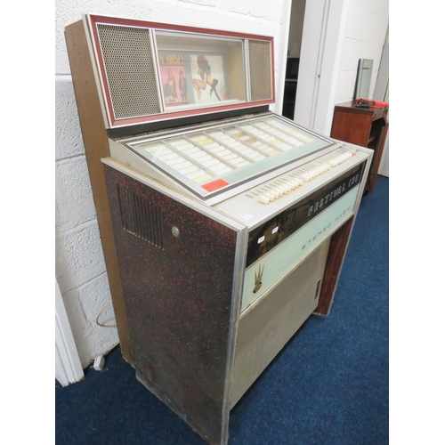 701 - Festival 130 Steromagic Juke box. Working condition unknown, however lights come on when plugged in.... 