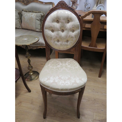 708 - Pretty reproduction antique parlour chair with carved decorations to back and legs. See photos.