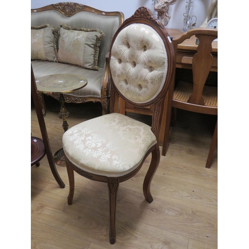 708 - Pretty reproduction antique parlour chair with carved decorations to back and legs. See photos.