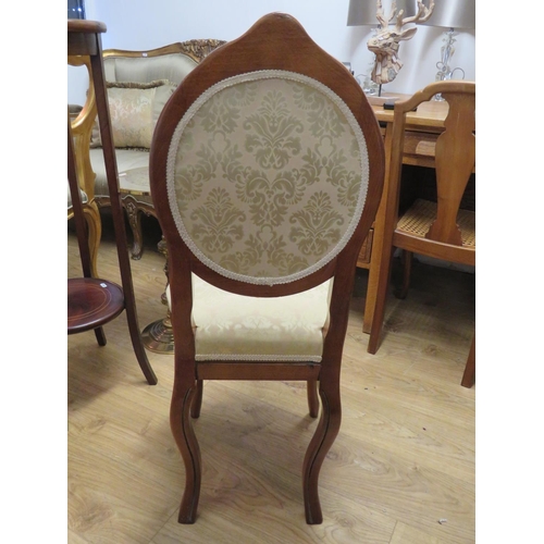 708 - Pretty reproduction antique parlour chair with carved decorations to back and legs. See photos.