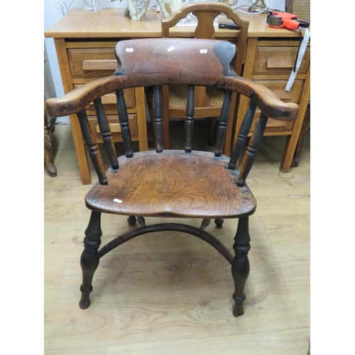 711 - Antique oak chair with crinoline stretcher, shaped seat. Good original patina. Loose joints but stur... 