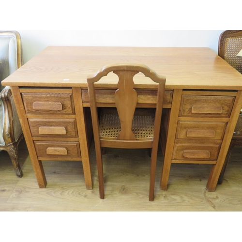 713 - Early 20th Century Solid Oak desk along with a bergere seated chair of similar construction and mate... 