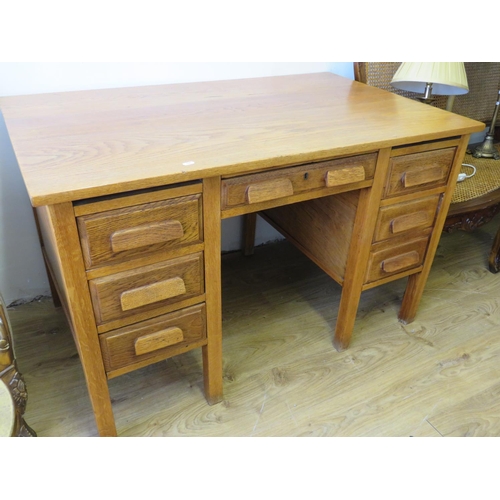 713 - Early 20th Century Solid Oak desk along with a bergere seated chair of similar construction and mate... 