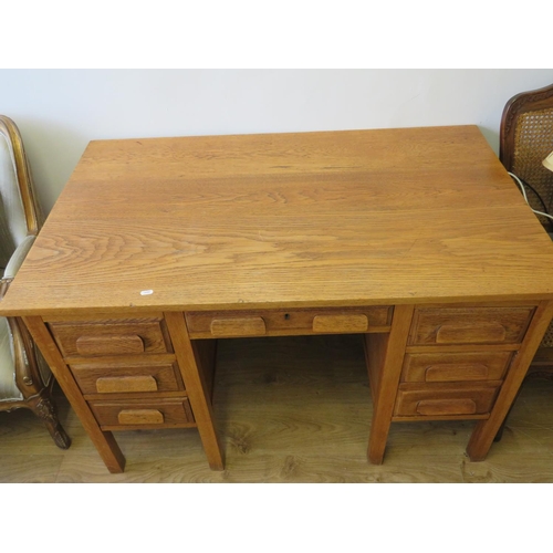 713 - Early 20th Century Solid Oak desk along with a bergere seated chair of similar construction and mate... 