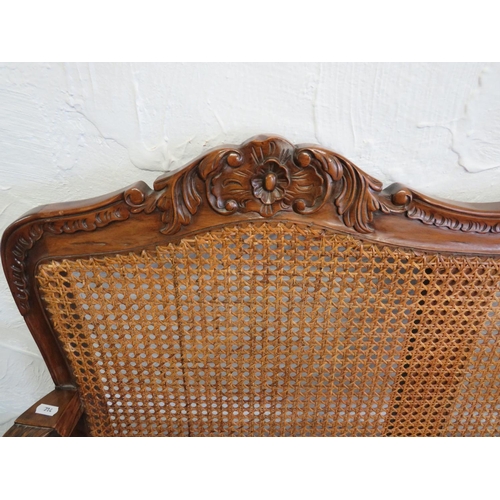 714 - Vintage Bergere two seat settee with carved decoration along with a matching chair. H:40 x W:43 x D:... 