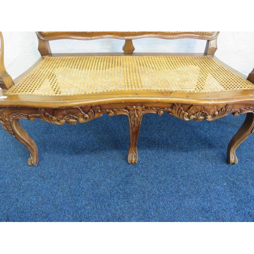 714 - Vintage Bergere two seat settee with carved decoration along with a matching chair. H:40 x W:43 x D:... 