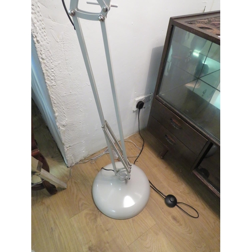 722 - Large and heavy metal based angle poise standard lamp with metal shade and foot switch. Very good co... 