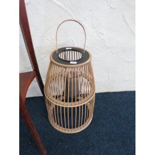 724 - Tall mahogany plant stand along with a birdcage style candle lantern. See photos.