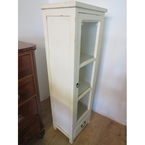 731 - Vintage white painted tall cabinet with a three section glass door and shelves within. Measures H:55... 