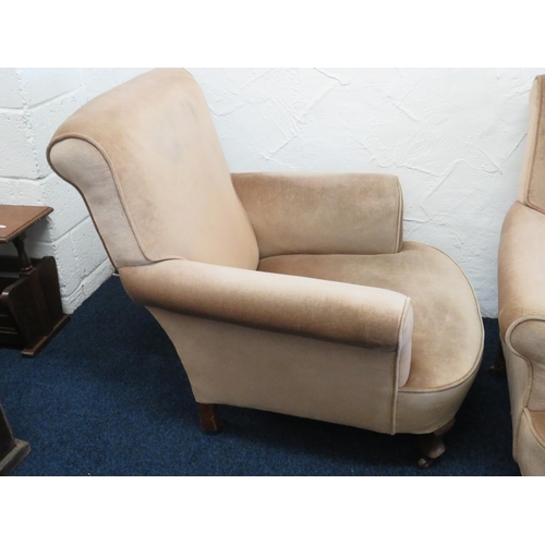 747 - Pair of Early 20th Century upholstered low chairs on original castors. Very good order. See photos.