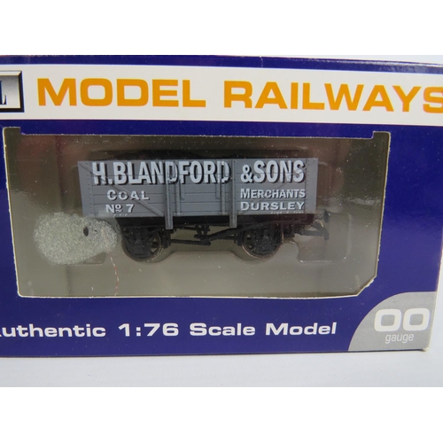 134 - Three Dapol 00 Scale, Seven and Five plank Trucks all boxed and unused condition. See photos.