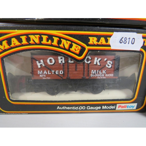 135 - Three Mainline 00 Scale Seven plank Horlicks wagons plus a Bachman 16 ton slope side rivetted side d... 