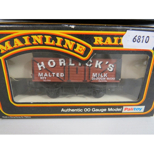 135 - Three Mainline 00 Scale Seven plank Horlicks wagons plus a Bachman 16 ton slope side rivetted side d... 