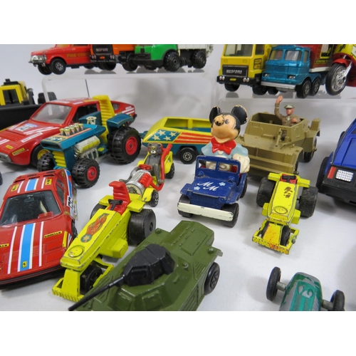 165 - Large selection of vintage playworn diecast vehicles including Matchbox, Ertl, Burago, Tonka etc.