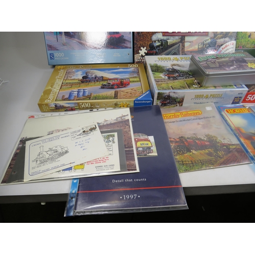 180 - Train related jigsaw puzzles and catalogues.