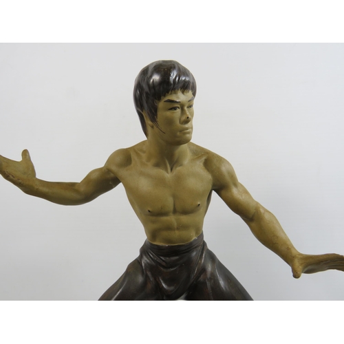 232 - 4 Chinese martial art masters ceramic figurines. The tallest measures 9