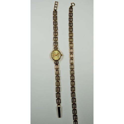 523 - 9ct Yellow Gold Ladies quartz watch by Geneve with 9ct yellow gold strap, along with a matching 9ct ... 