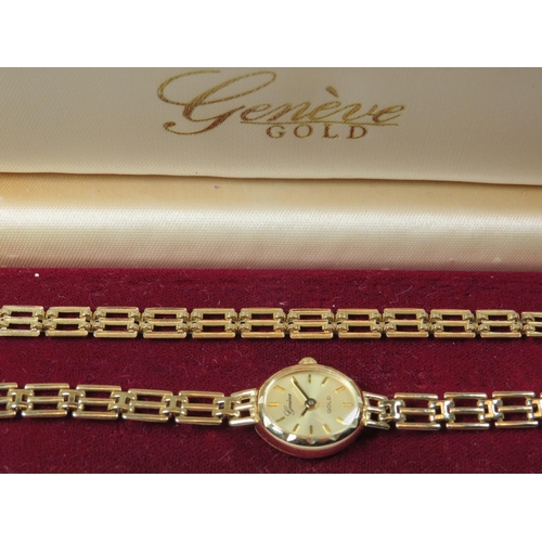 523 - 9ct Yellow Gold Ladies quartz watch by Geneve with 9ct yellow gold strap, along with a matching 9ct ... 