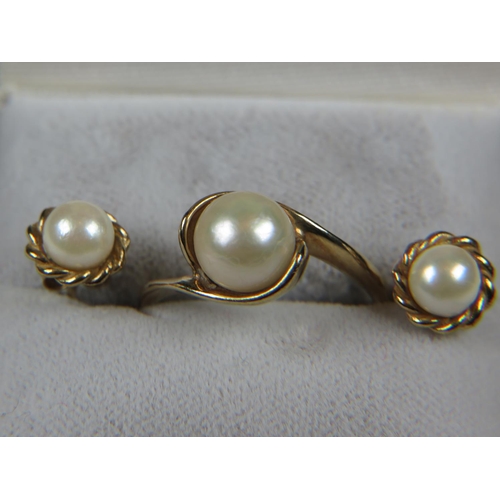 530 - 9ct Yellow Gold pearl set ring. Finger size 'N'   3.1g together with a matched pair of 9ct yellow go... 