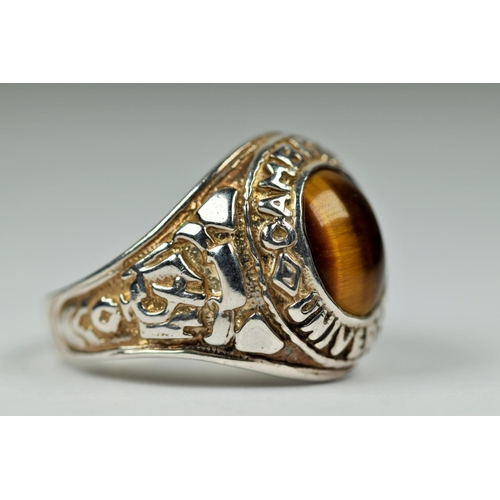 403 - 925 Sterling Silver College ring set with a large Tiger's Eye central stone. Finger size 'S' 9.3g