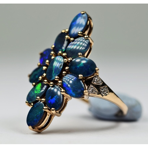 411 - 9ct Yellow Gold statement ring set with Blue Opals and interspersed with melee Diamonds. Lovely ring... 