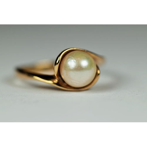 530 - 9ct Yellow Gold pearl set ring. Finger size 'N'   3.1g together with a matched pair of 9ct yellow go... 