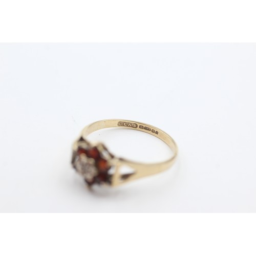 438 - 9ct gold diamond & garnet cluster dress ring (2.2g)     734508