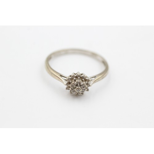 439 - 9ct white gold diamond cluster dress ring (1.9g)     734500