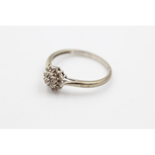 439 - 9ct white gold diamond cluster dress ring (1.9g)     734500