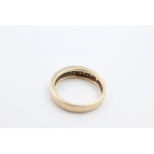 442 - 9ct gold diamond gypsy setting half-eternity ring (2.8g)     734496