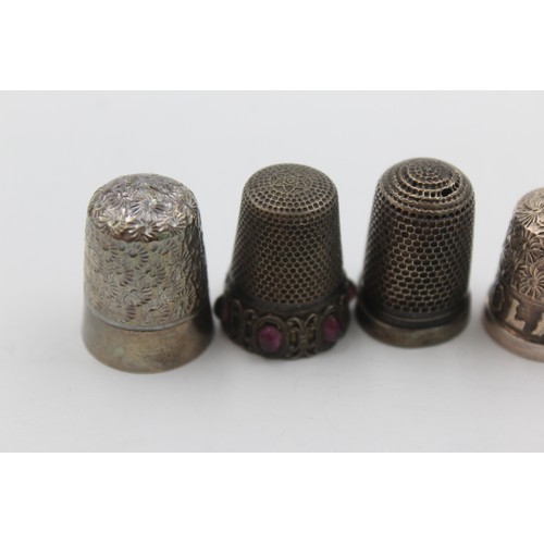 352 - Five Collectable white metal thimbles    664646