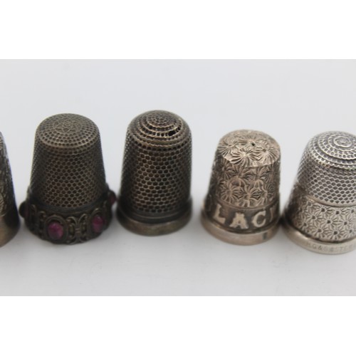 352 - Five Collectable white metal thimbles    664646