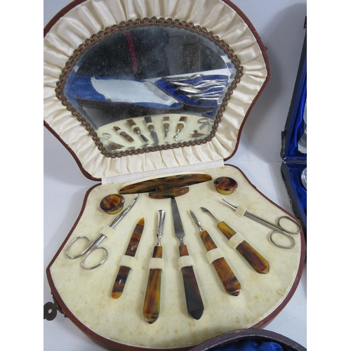 655 - Cased vintage manicure set and 2 serving spoon sets.