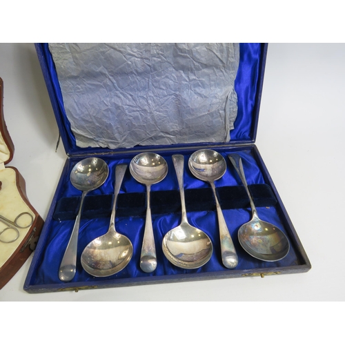 655 - Cased vintage manicure set and 2 serving spoon sets.