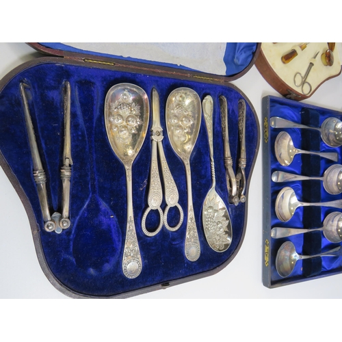 655 - Cased vintage manicure set and 2 serving spoon sets.