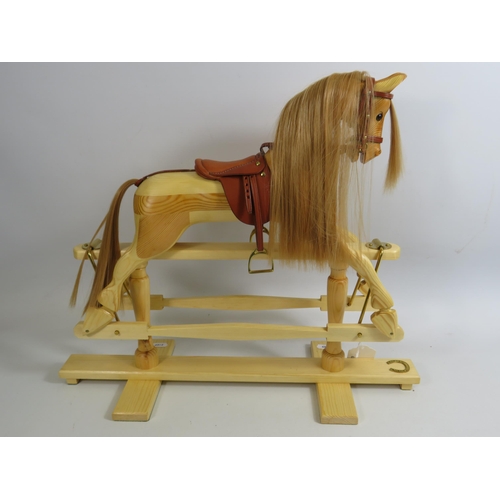 673 - Beautifully handmade miniature wooden rocking horse with leather tack. 15.5