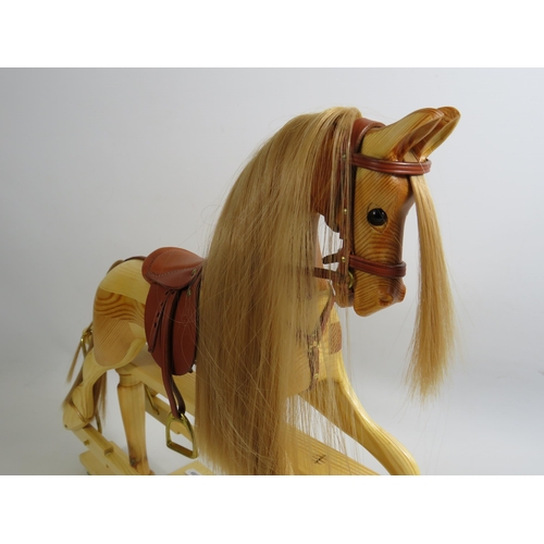 673 - Beautifully handmade miniature wooden rocking horse with leather tack. 15.5