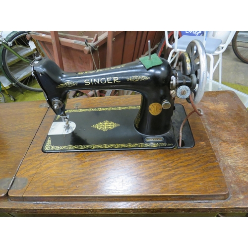 634 - Singer sewing machine and table