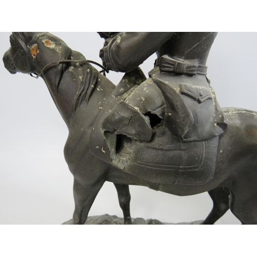 686 - Pair of vintage spelter figures depicting soldier on horse back. Approx 14