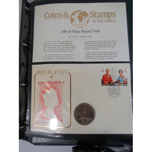 554 - Two well presented albums of Coins and stamps of the world.  See photos.