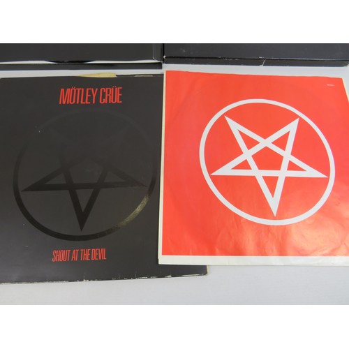 584 - Vinyl LP, Motely Crue, Shout at the Devil plus a boxed ltd edition, 'Little Angels' includes a giant... 