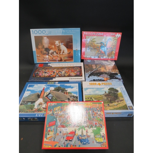 944 - 7 Jigsaw puzzles all new in cellophane.