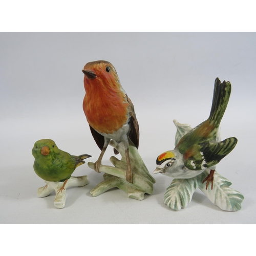 4 - 3 Bisque Goebel bird figurines Robin, Goldcrest and Greenfinch. The tallest measure 12.5cm tall