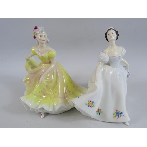 9 - 2 Royal Doulton figurines Ninette HN 2379 & Kate HN2789. Approx 20.5cm tall.