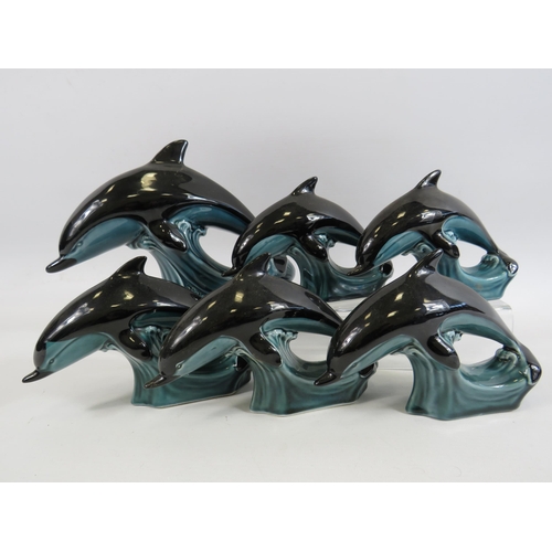 49 - 1 Medium and 5 Small Poole pottery Dolphins.