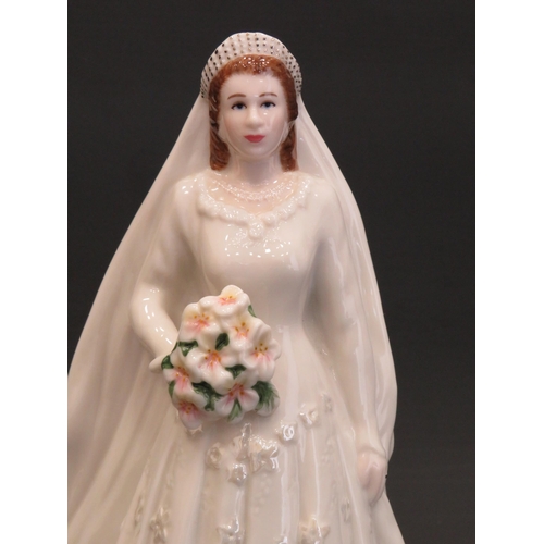 55 - Royal Worcester figurne of Queen Elizabeth II, Diamond wedding Anniversay figure.