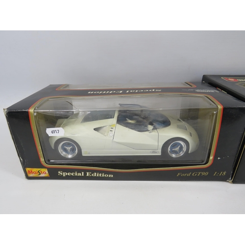 108 - Maisto special edition Ford Gt 90 and a Burago Jaguar E Coupe 1961 die- cast vehicles.