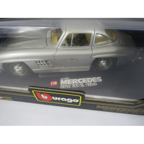 98 - 2 x Burago 1:18 scale die-cast vehicles Mercedes Benz 300SL 1954 & Jaguar E Coupe 1961.