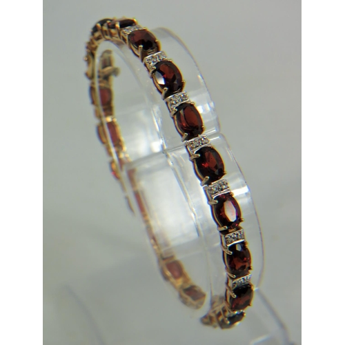 401 - 14ct Yellow Gold Diamond and Garnet set Bracelet  13.1g